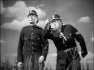 Young and Innocent (1937)pointing and police